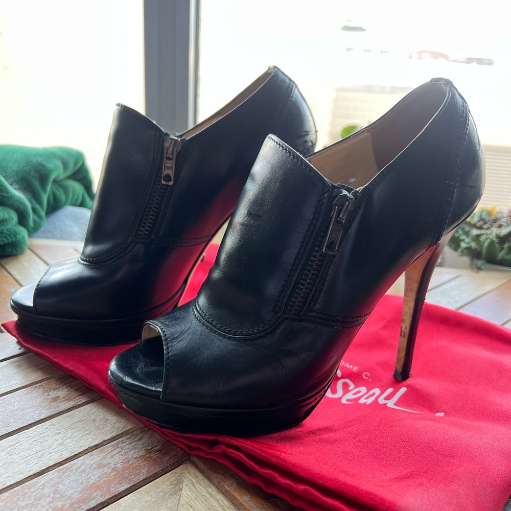 Jerome C. Rousseau platform black leather stilettos
